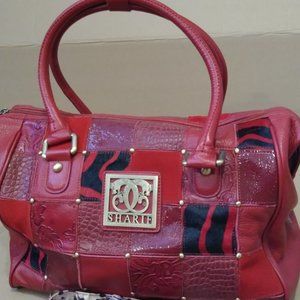 A red and black leather and multi-textured handbag by Sharif with insert bag